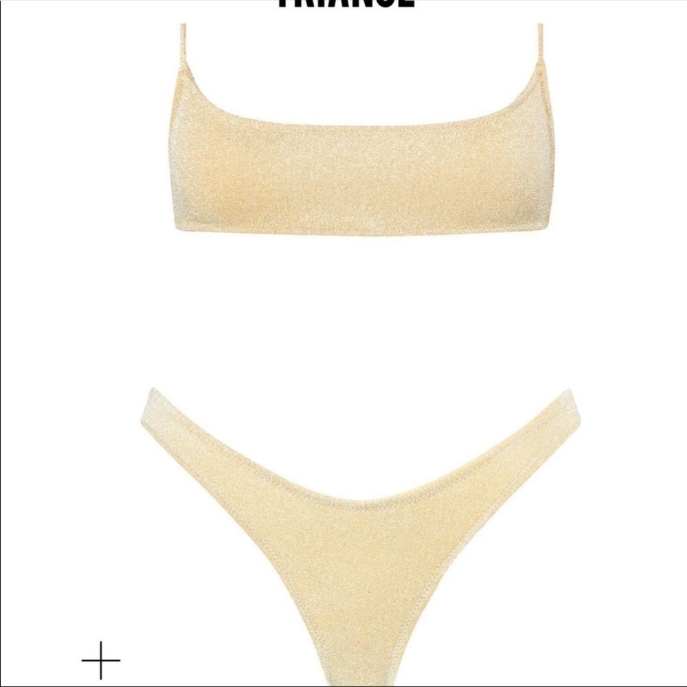 Very loved Triangl bikin. Bottoms are small top is medium.